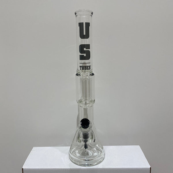 Made by US Tubes

Made in Berkeley, CA

Features 50 x 7mm beaker bottom water pipe

Features 24mm joint

Features removable 24/19mm showerhead downstem

Comes with matching 19mm slide

Features US Tubes decal (decal may vary)

Approximately 19 inches at tallest point

Approximately 6 inches at widest point

